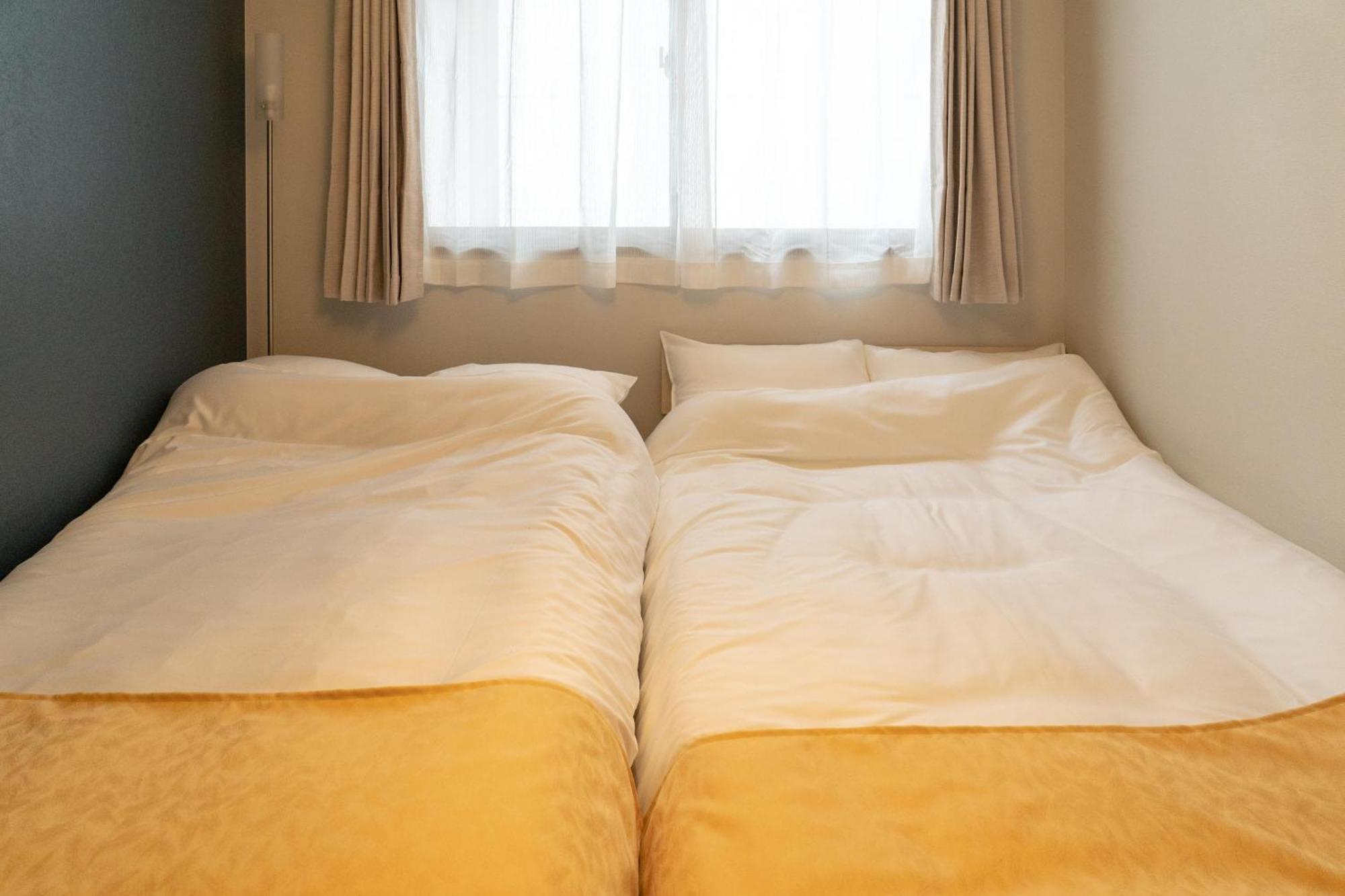 大阪ルミエール夕陽丘 Apartamento Exterior foto