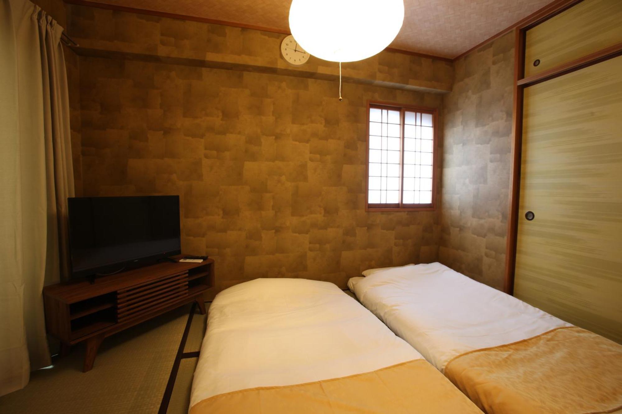 大阪ルミエール夕陽丘 Apartamento Exterior foto