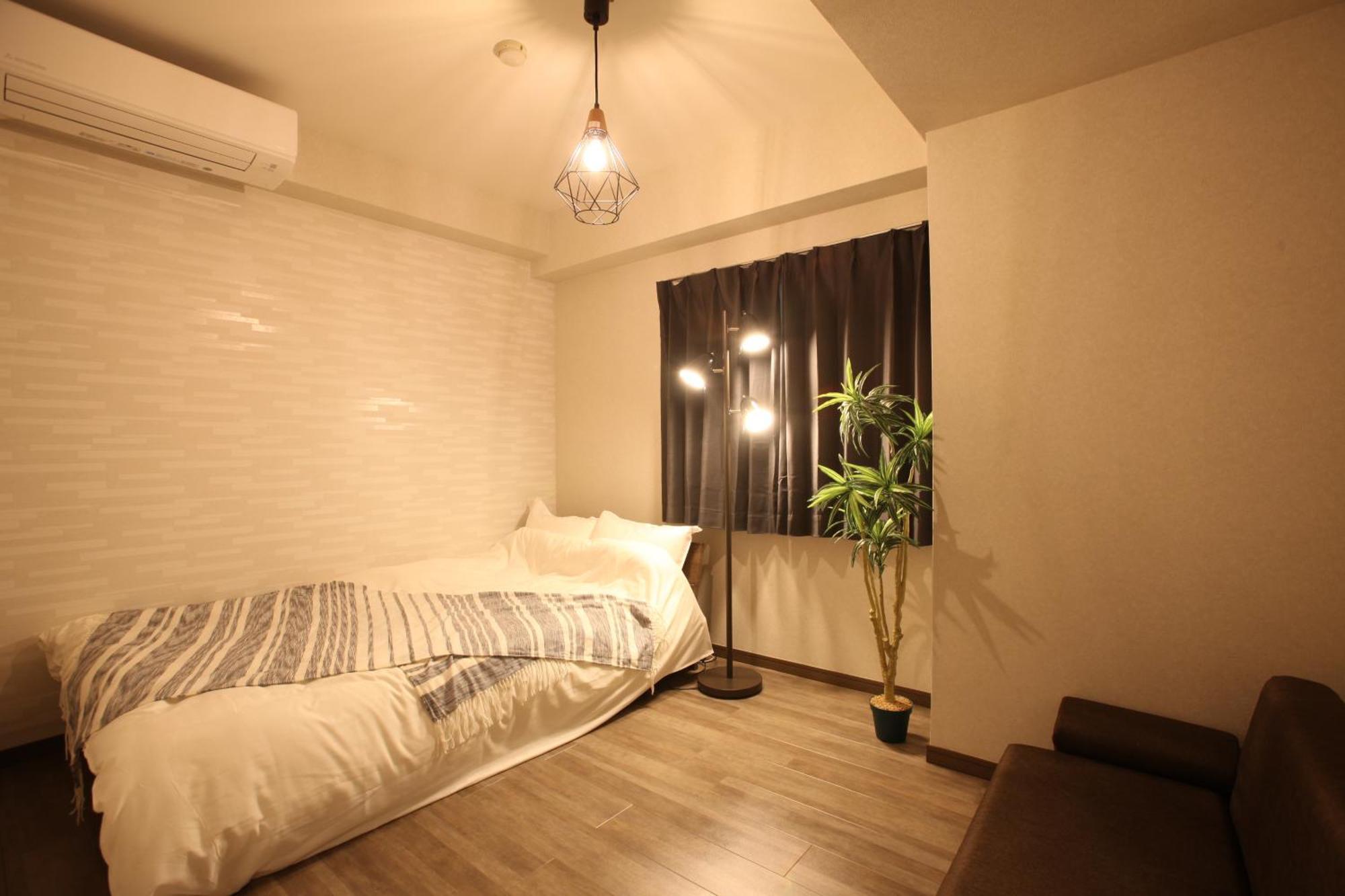 大阪ルミエール夕陽丘 Apartamento Exterior foto
